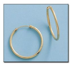 33-A302 Pendientes Aros superficie pulida en Oro de 18 Kl. Diámetro interior de 25mm y grosor 2mm.