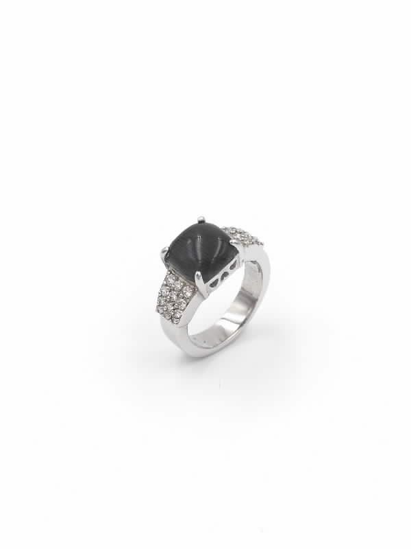 Anillo de plata rodiada con circonitas blancas y cristal negro