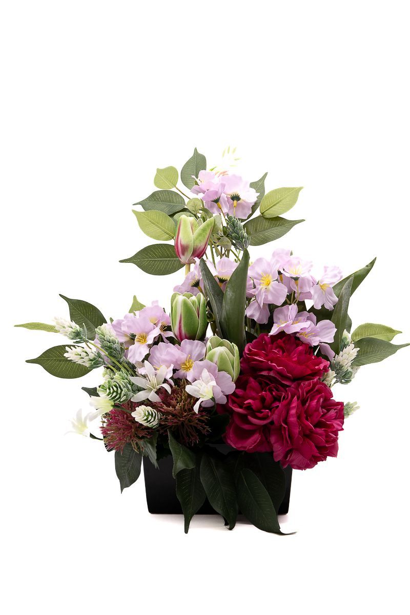 Centro de cementerio vibrante con tonos fucsia y base de cerámica