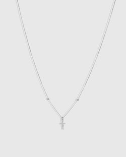 Collar cruz de oro y diamantes.