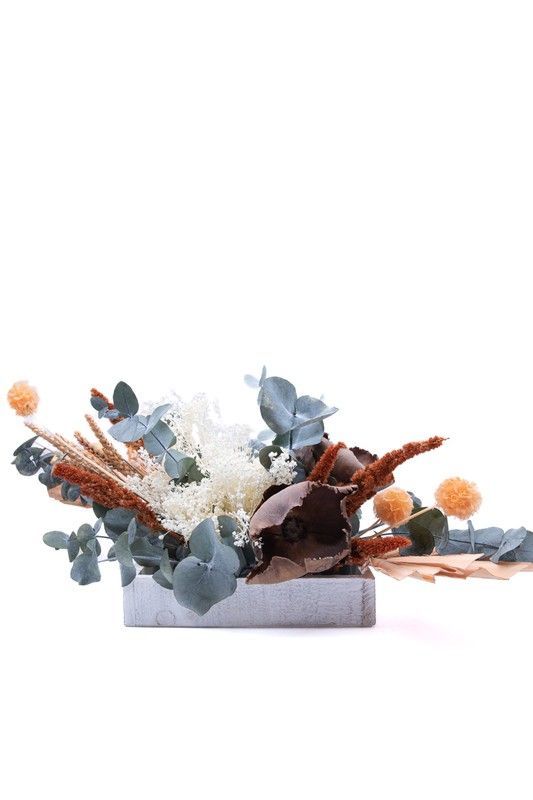 Elegante centro alargado en tonos naranjas y blanco. Naturalidad y Calidez sin igual