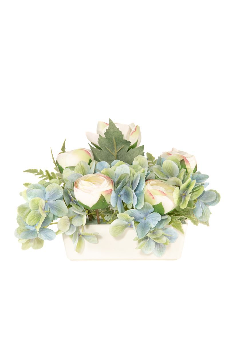 Fino y delicado centro de cementerio en tonos azul baby