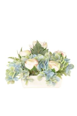 Fino y delicado centro de cementerio en tonos azul baby