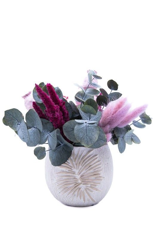 Frescura en tonos rosas junto con un tiesto de cerámica