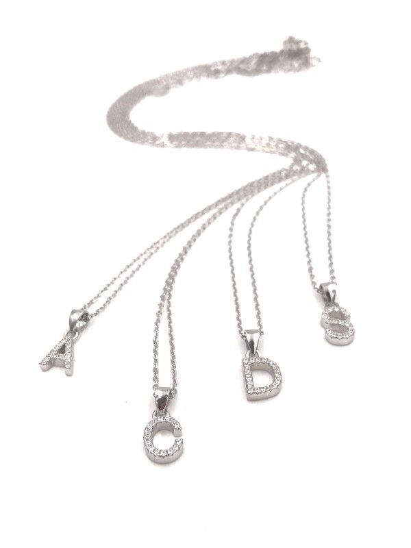 Iniciales de plata rodiada con circonitas engastadas