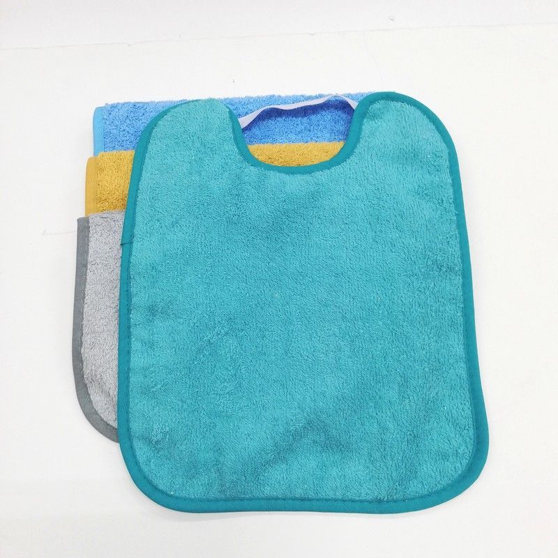 Pack 4 baberos de toalla con goma y impermeable 25x30 cm 999
