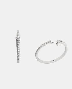 Pendientes aros de oro y diamantes.