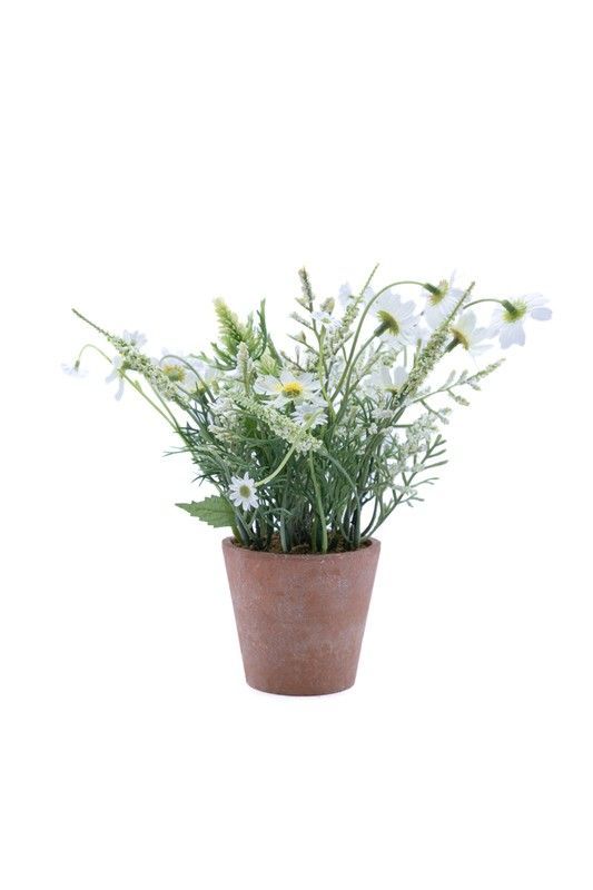 Pequeña maceta de flores artificial con base de terracota