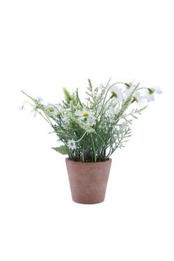 Pequeña maceta de flores artificial con base de terracota