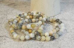 Pulsera de Merlinita bola 6 mm