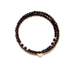 Pulsera espiral de onix y perla. Plata.