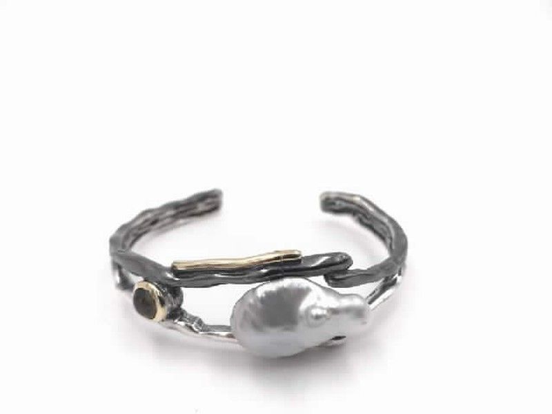 Pulsera labruixeta rígida de plata con perla y turmalina