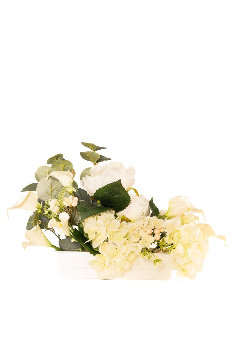 Pureza en este centro de cementerio en tonos blancos