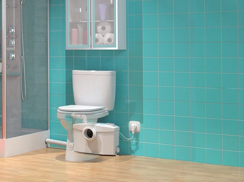 triturador y bomba que evacua las aguas de un baño completo.